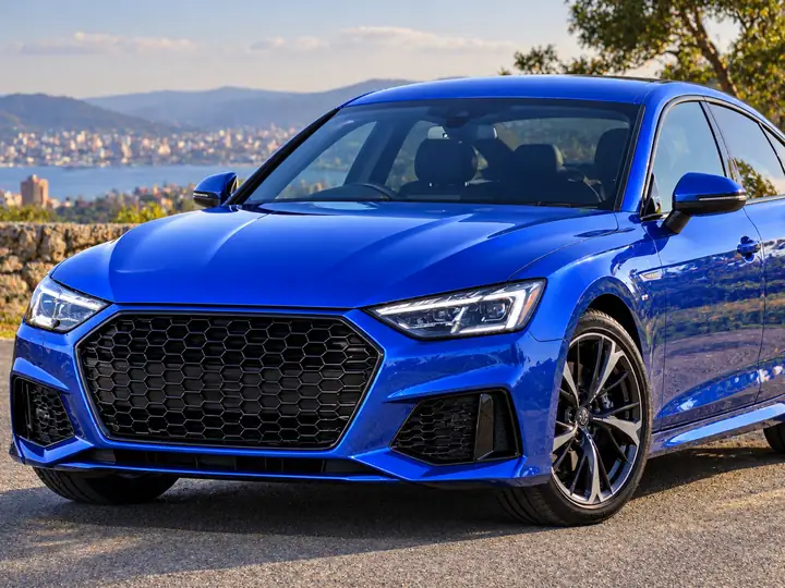 A blue car photographed with clear exterior details.